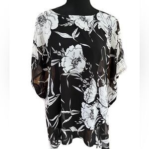 Le Luxe black / white semi sheer floral batwing top, longer in back, one size